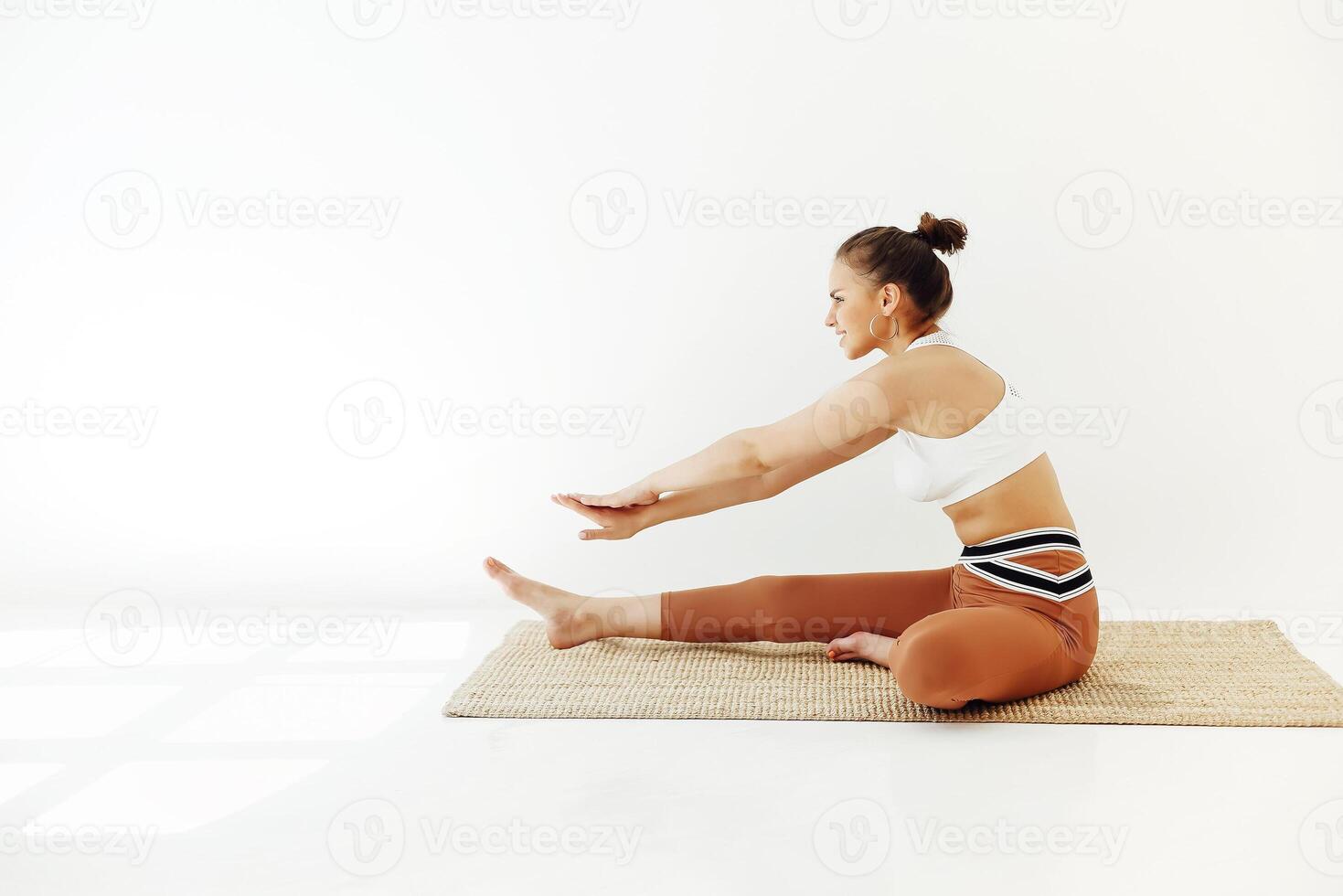 Slim woman meditating at home photo
