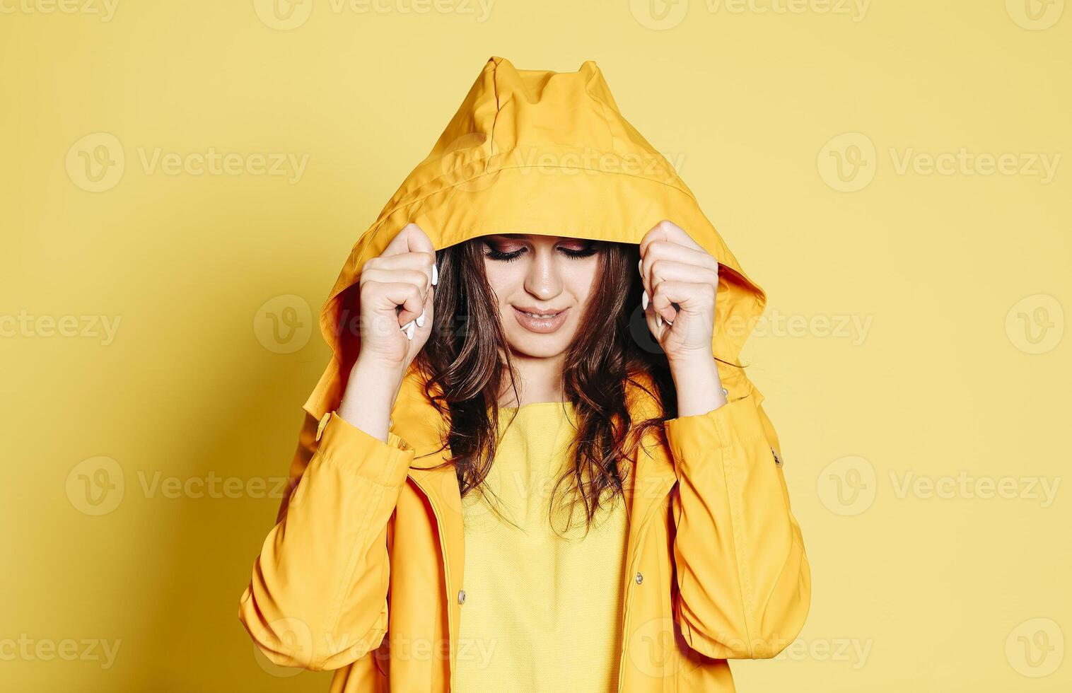 Cheerful woman in yellow outfit photo