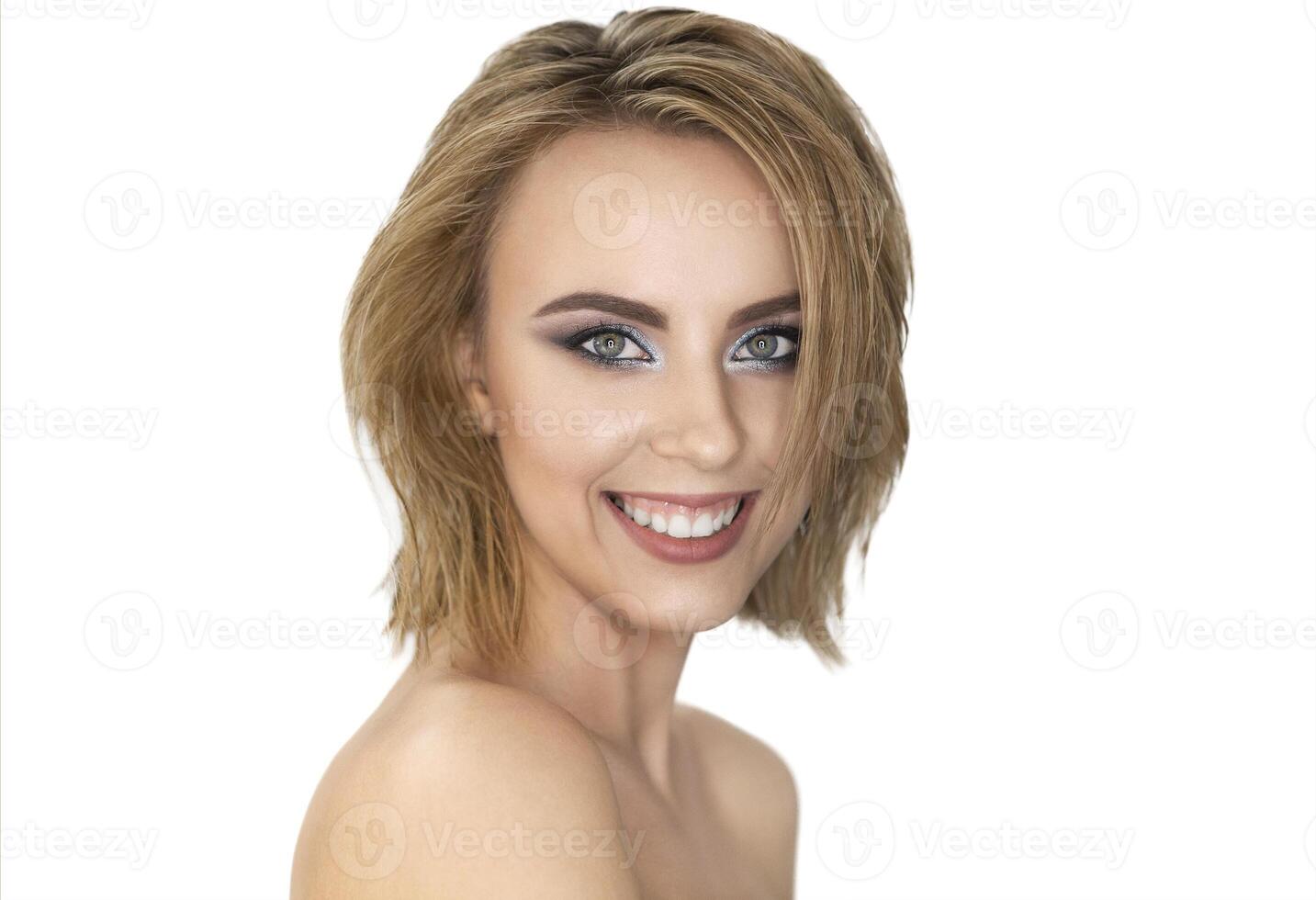 Beauty portrait. Beautiful blond woman with perfect fresh skin and hair with wet effect. photo
