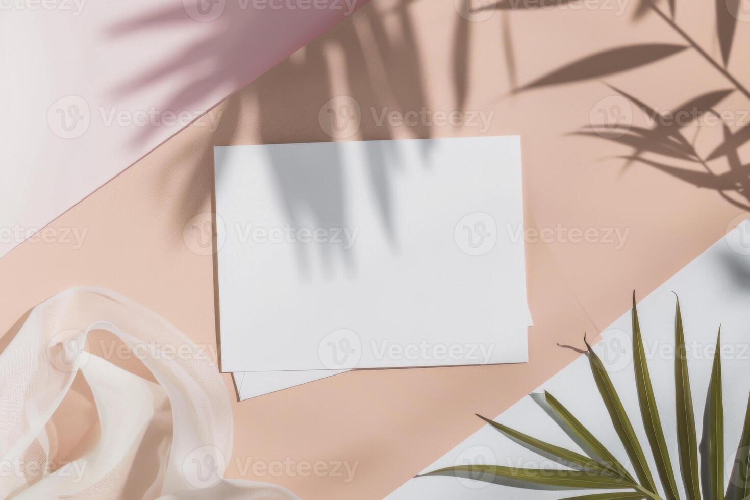 Creative flat lay top view mockup of blank white business card on pastel pink and beige background with palm leaves shadows photo