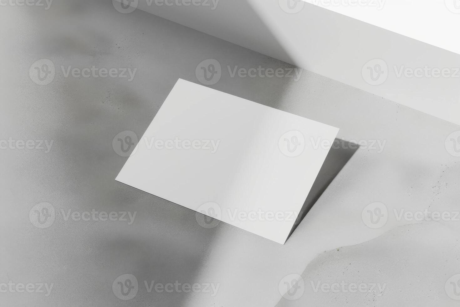 Top view of A4 business card mockup on floor photo