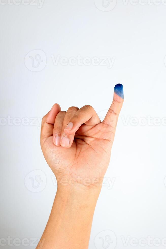 Hand with Ink for Indonesian Election Day or Pemilu photo