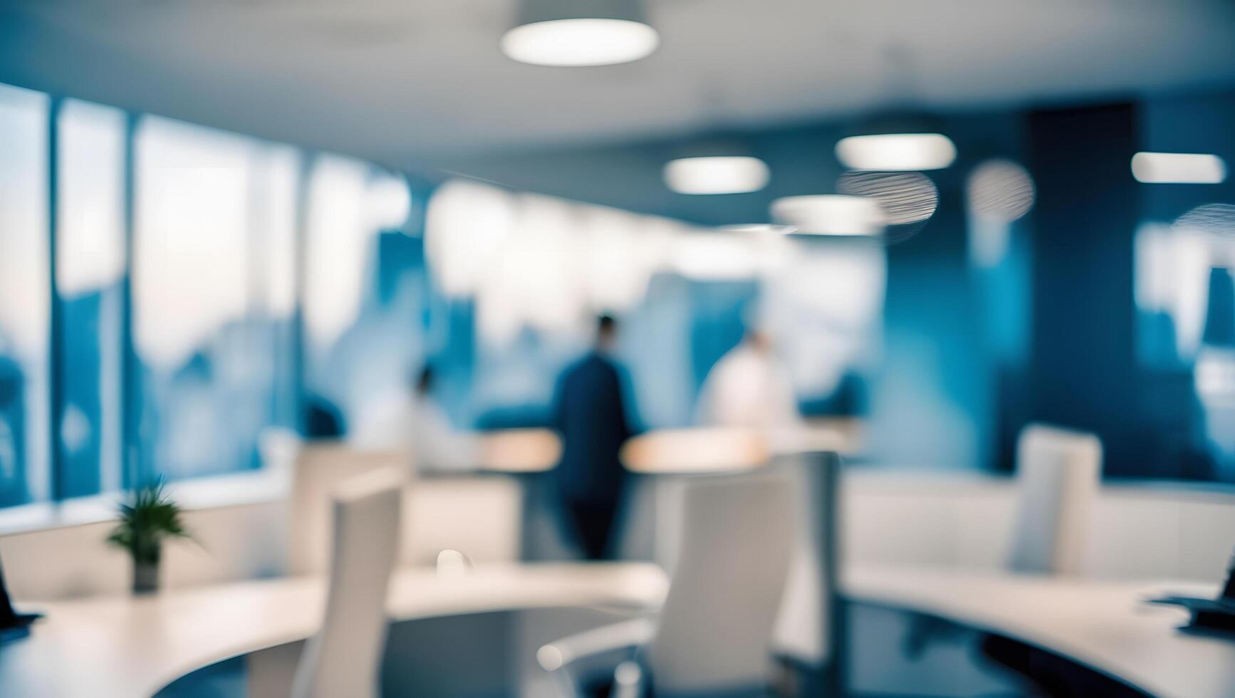 Blurred modern office background with sleek furniture and soft lighting, creating a sophisticated and professional workspace. Business environment concept photo