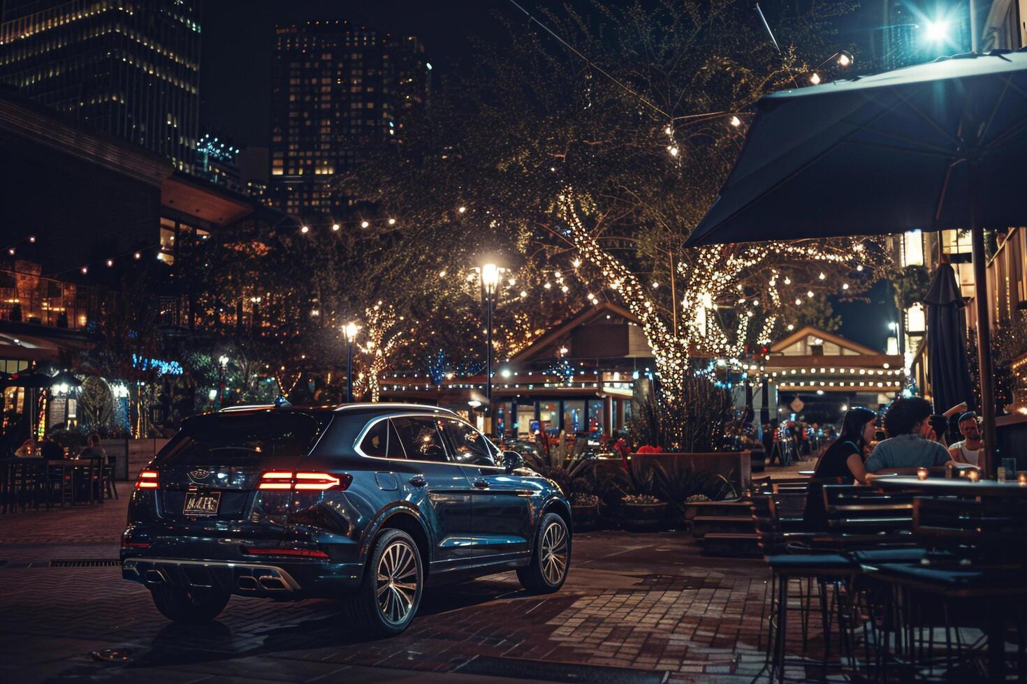 Luxury crossover parked at highend urban restaurant with diners seated at outdoor tables and city lights twinkling in the background photo