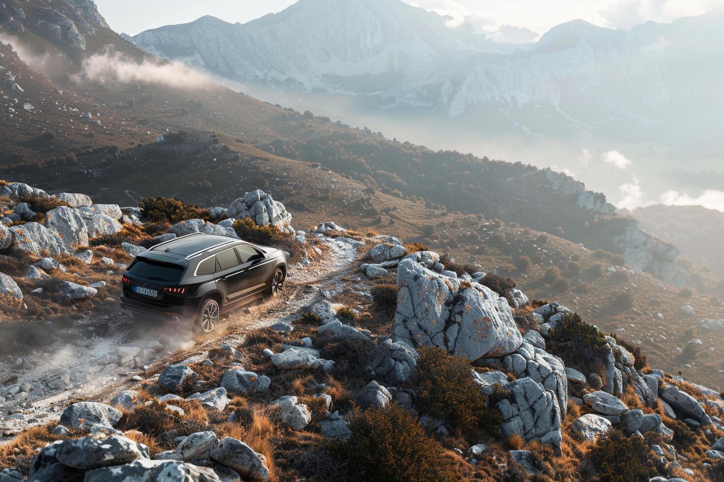 Powerful Hybrid SUV driving off road on rugged mountain trail with rocky terrain and panoramics photo