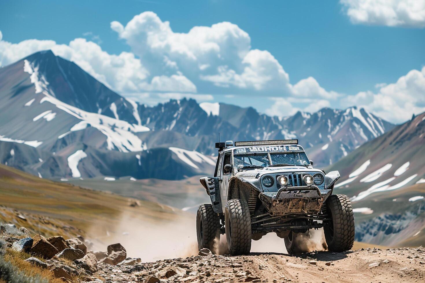 Adventure Off Road Vehicle Crossing Rugged Terrain with Rocky Mountains in the Background   nature background photo
