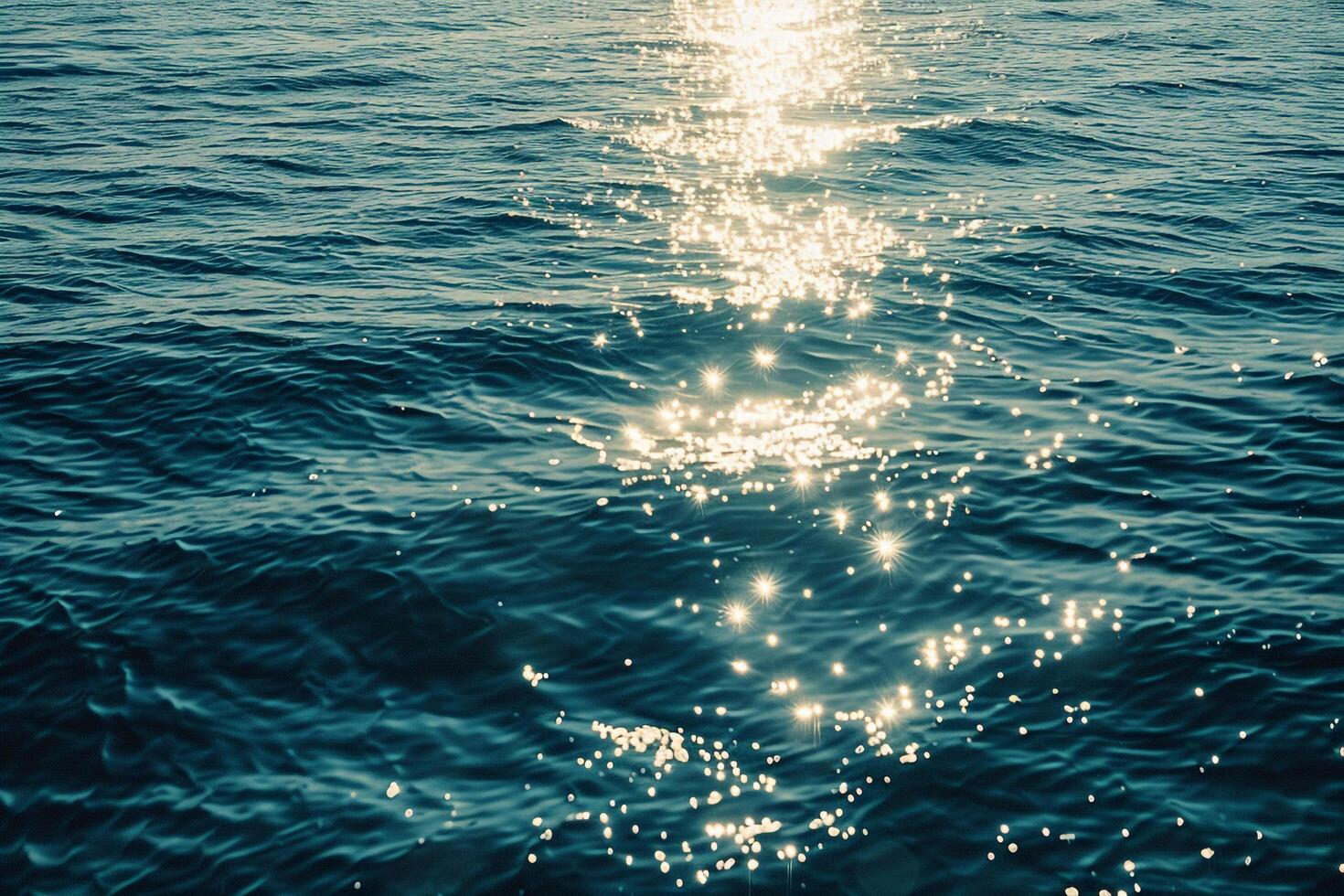 Seascape Sunlight Creating Glittering Path Across the Surface of Calm Sea nature background photo