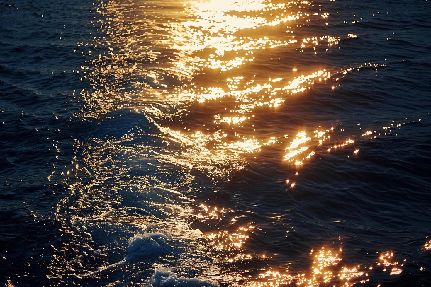 Seascape Sunlight creating shimmering path on the surface of the sea during sunset  nature background photo