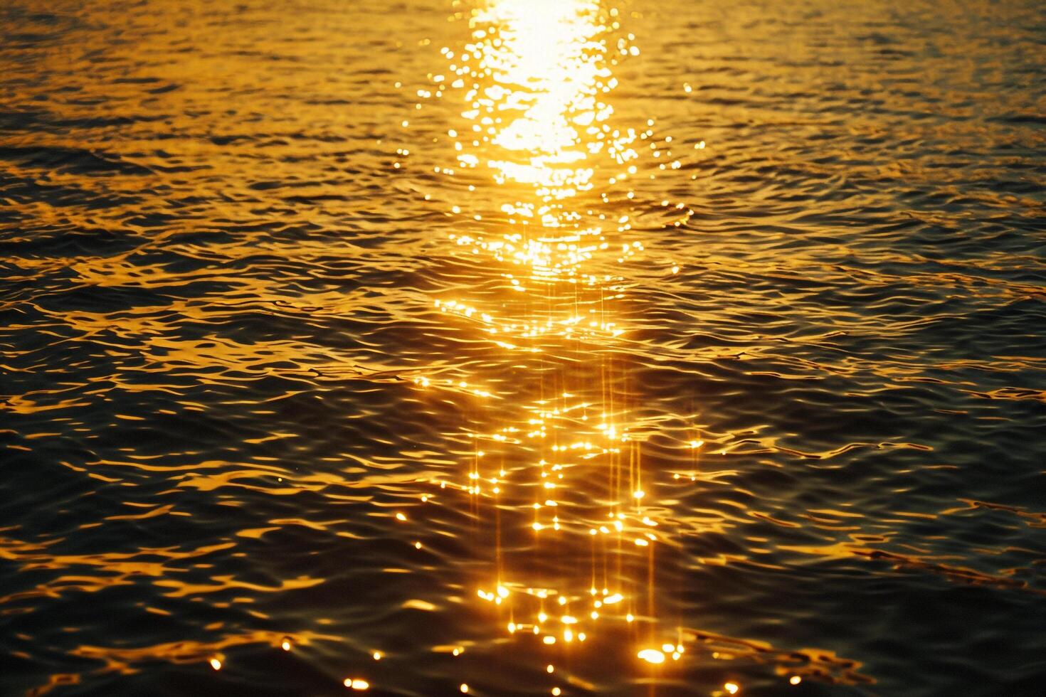 Seascape Sunlight creating shimmering path on the surface of the sea during sunset  nature background photo