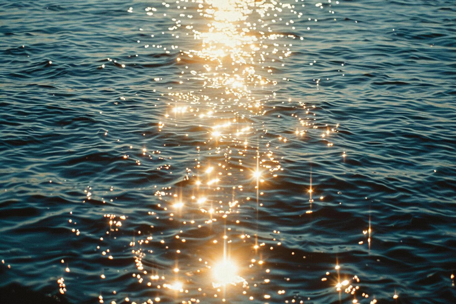 Seascape Sunlight Creating Glittering Path Across the Surface of the Ocean nature background photo