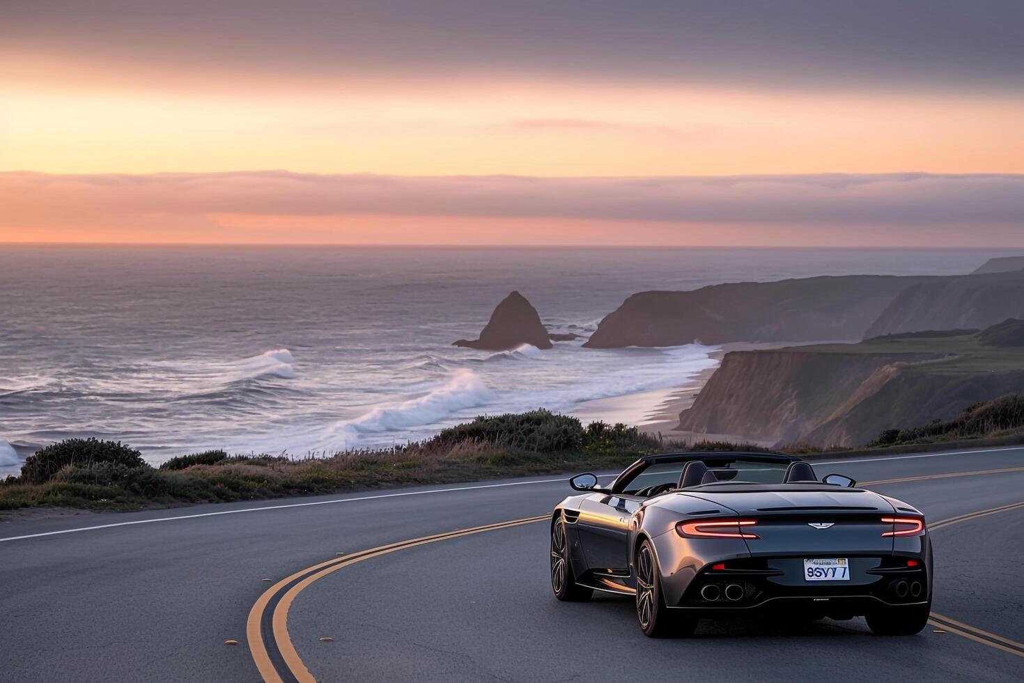 Convertible Sports Car Cruising Along Coastal Highway with Ocean Horizon photo