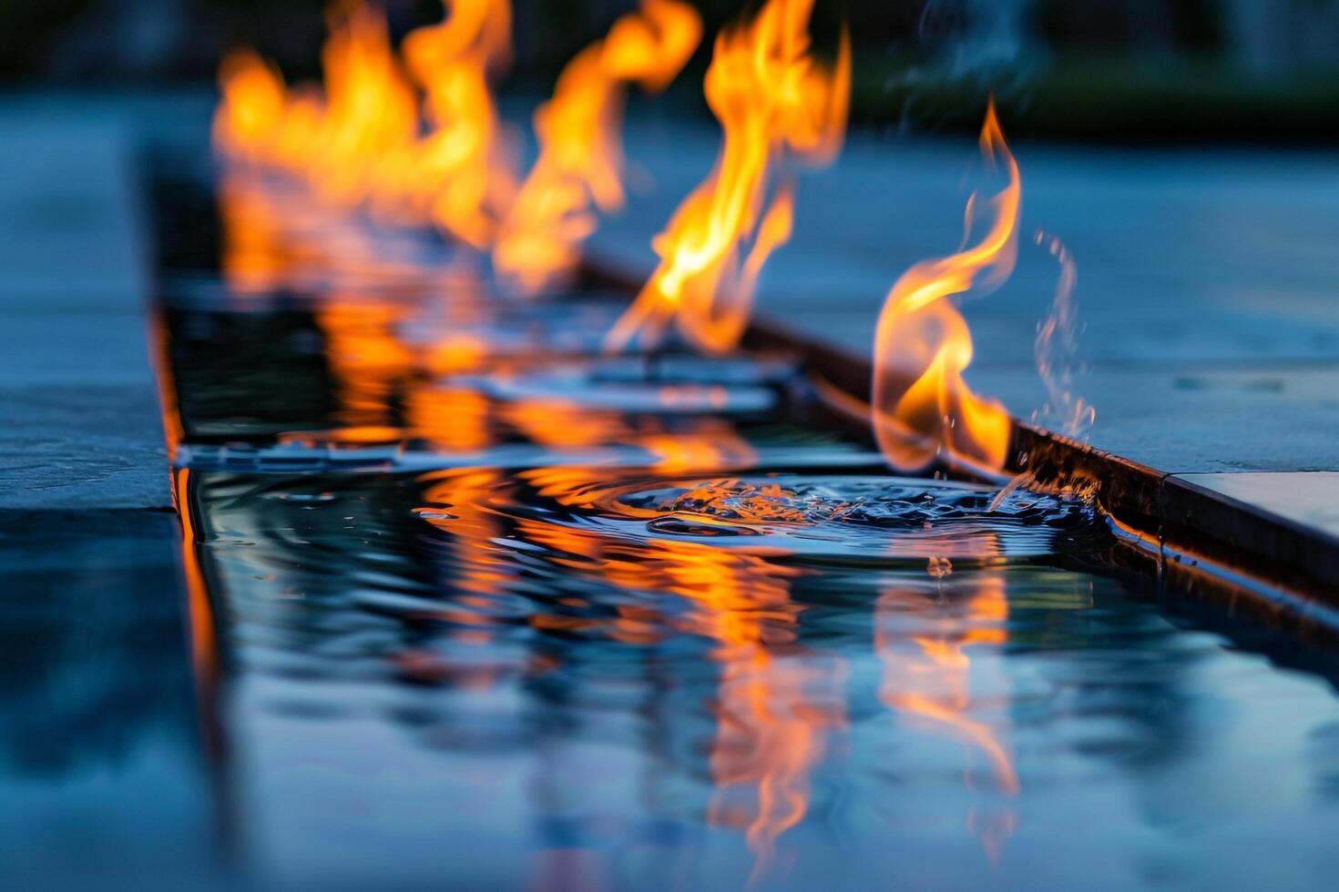 Abstract patterns of flames reflected in polished marble fountain creating ambiance background nature photo