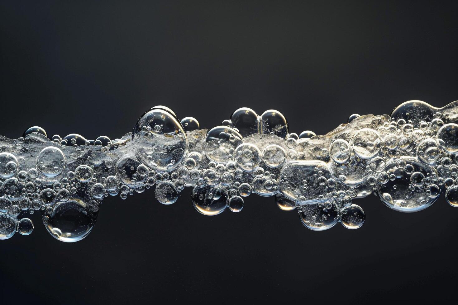 Abstract of Bubbles Trapped in Ice Creating Pattern Against Dark Background photo