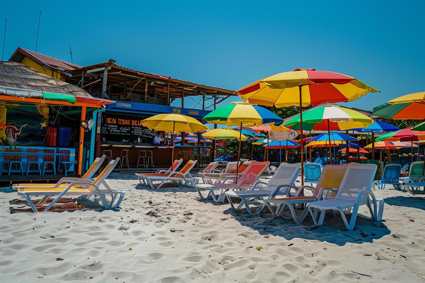 Beach  with Colorful Umbrellas Sun Loungers and Beach Bar Vibrant nature background photo