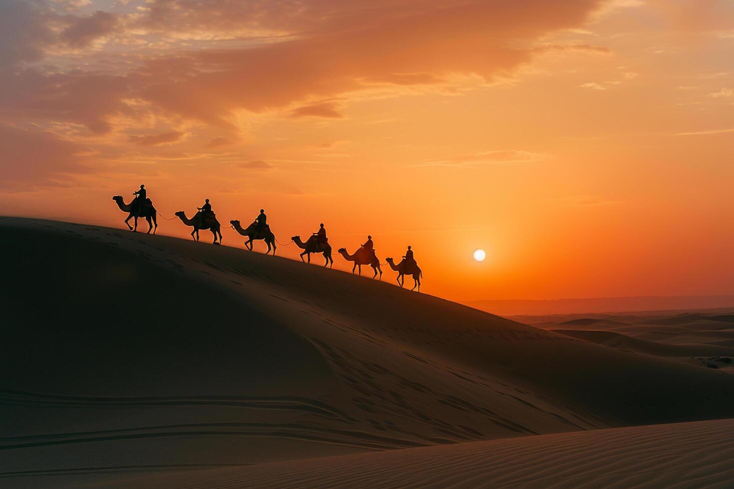 mesmerizing beach with golden sands and towering dunes highlighted by camel riders silhouetted against a  fiery sunset sky for a striking visual. Nature Background photo