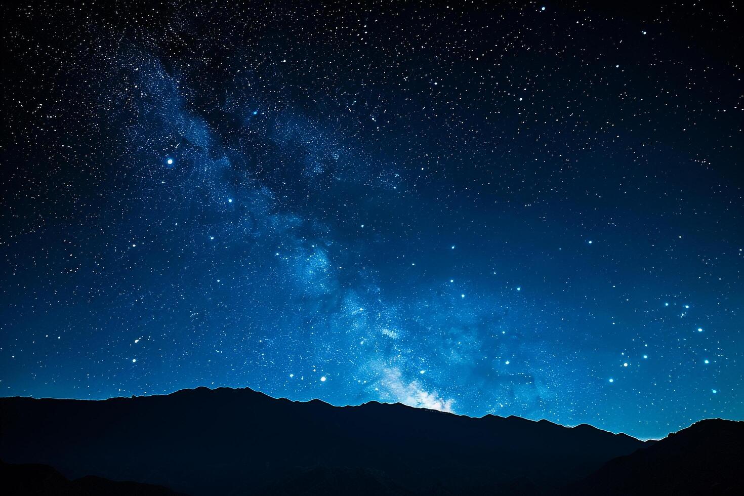 Milky Way Galaxy Over Silhouetted Mountain Range Background Nature photo
