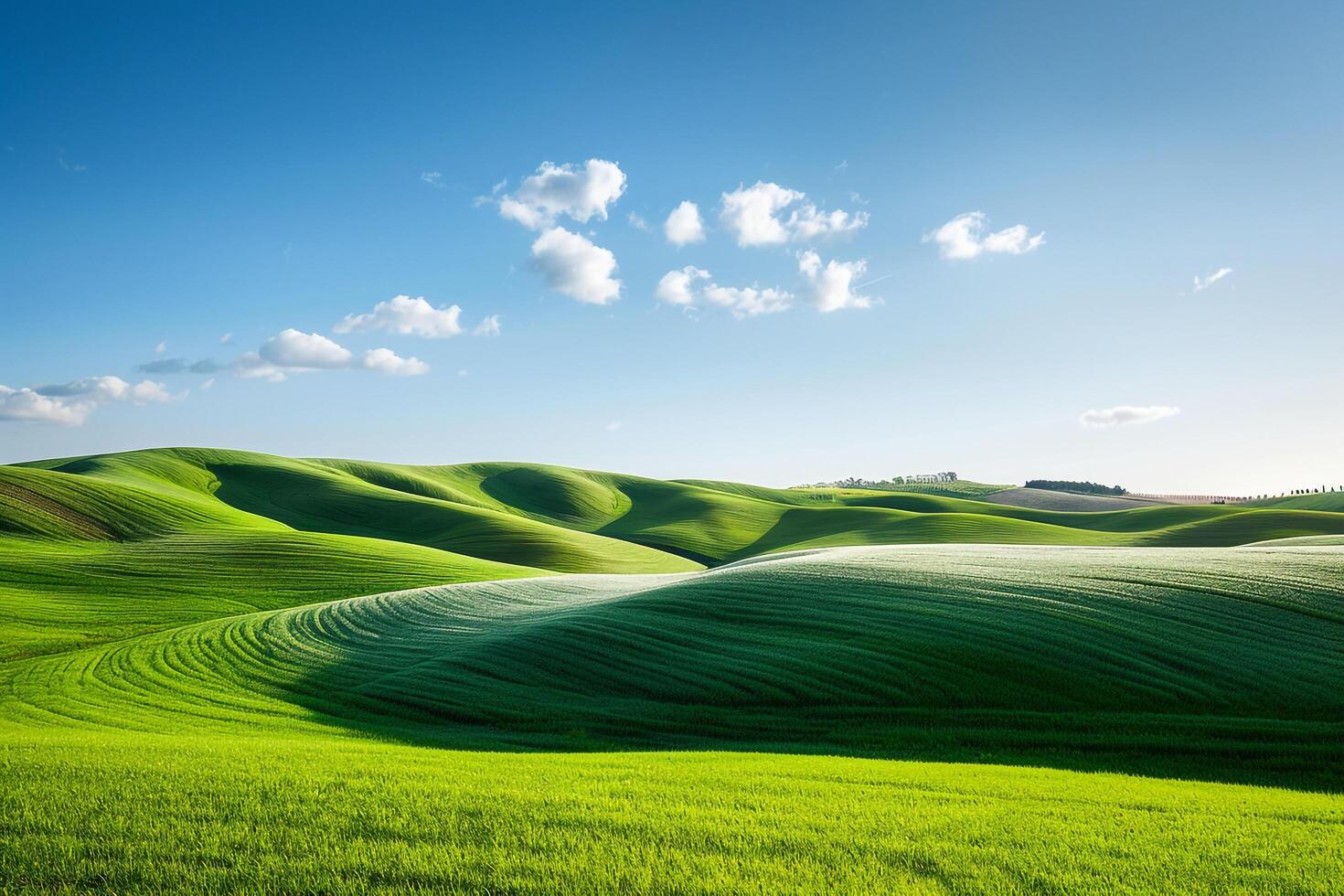 Rolling Green Hills Under a Clear Blue Sky. Nature Background photo