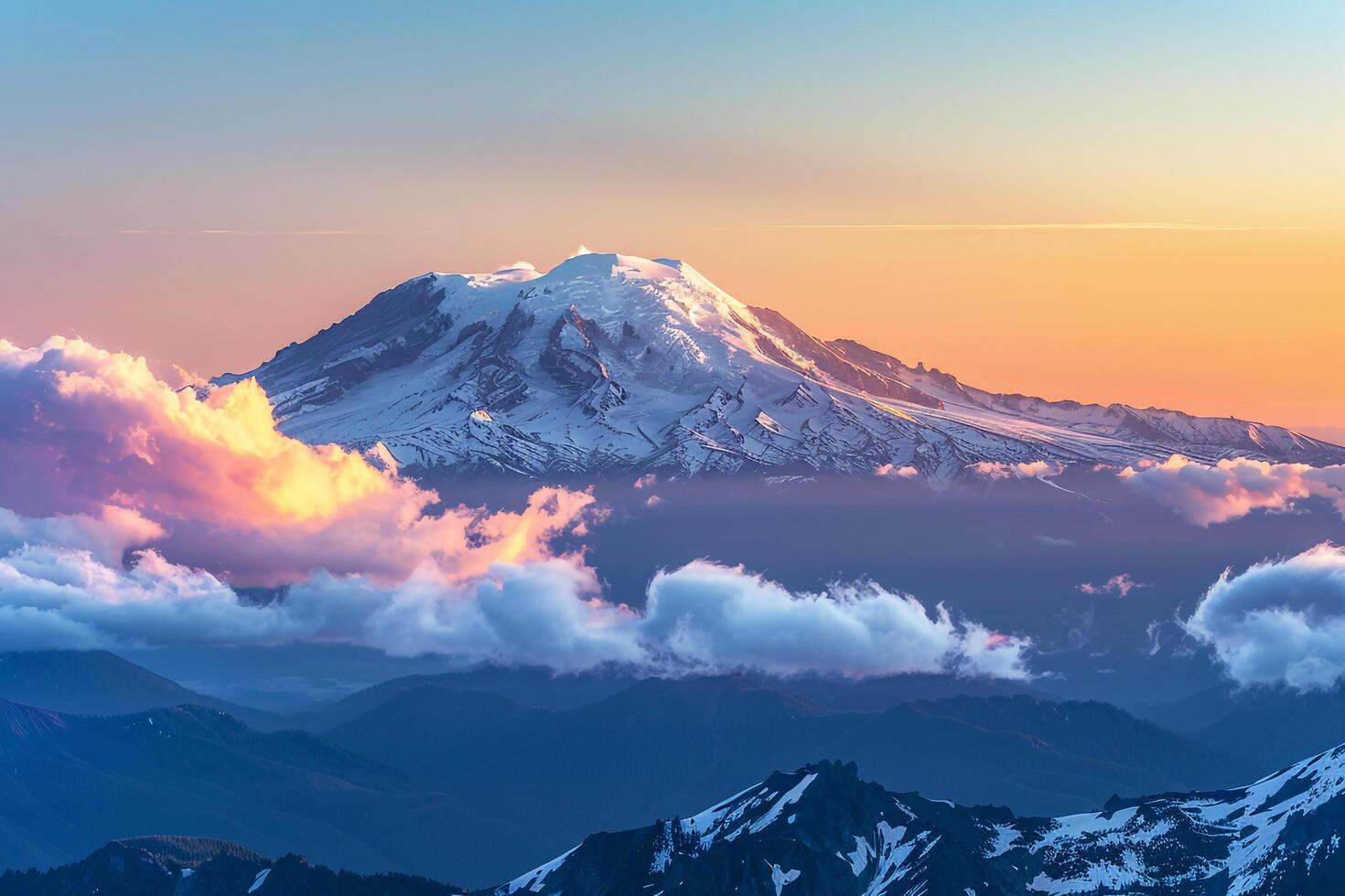 Sunrise over a snowcapped mountain peak. background. Nature photo