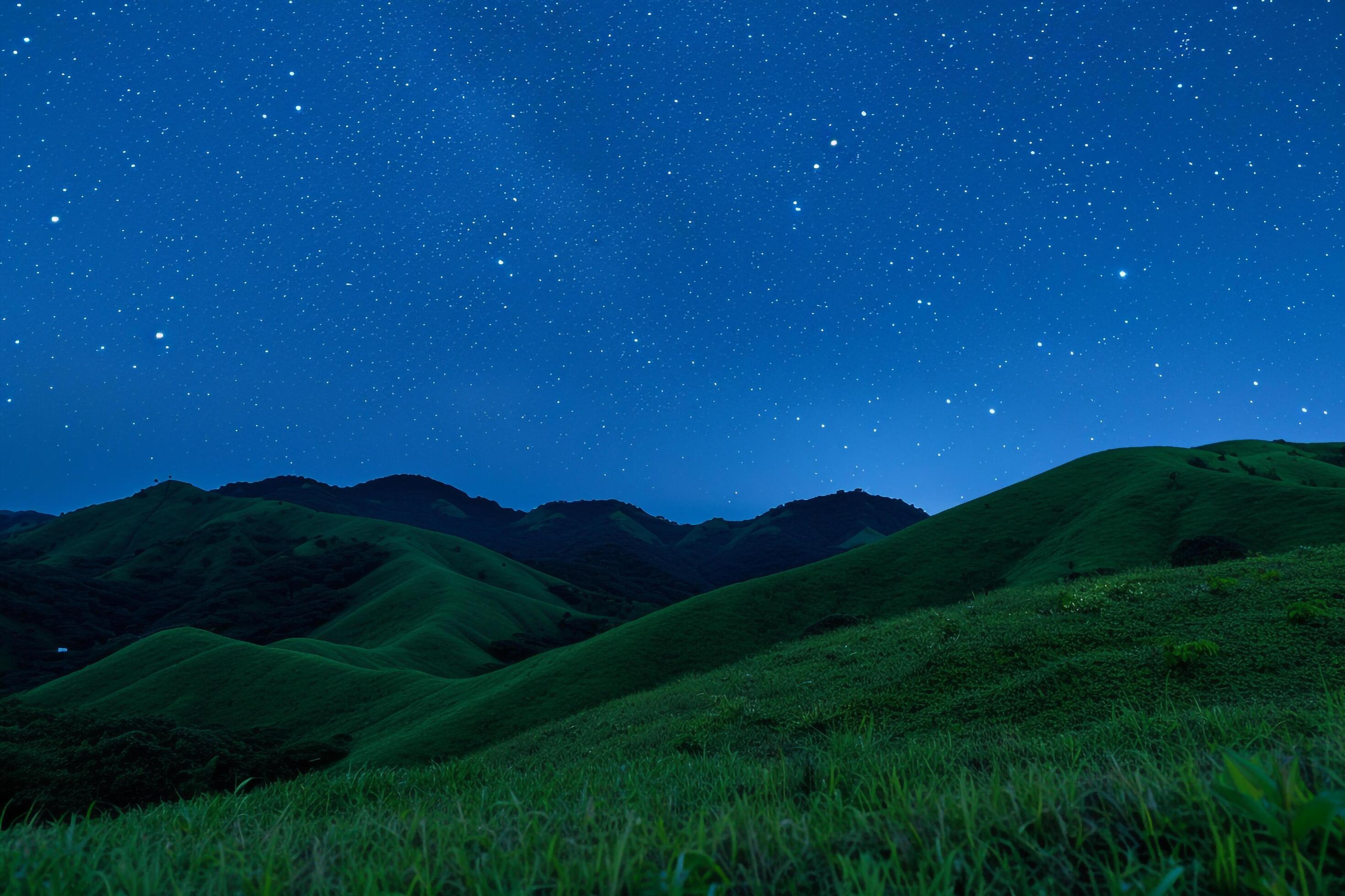 Night green hills under a starry sky. background. Nature