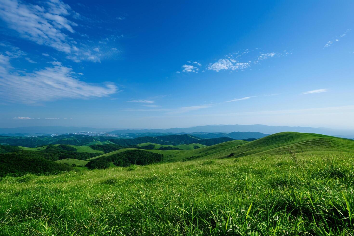 Wide Angle Green Hilltops Under a Clear Blue Sky Nature Background photo