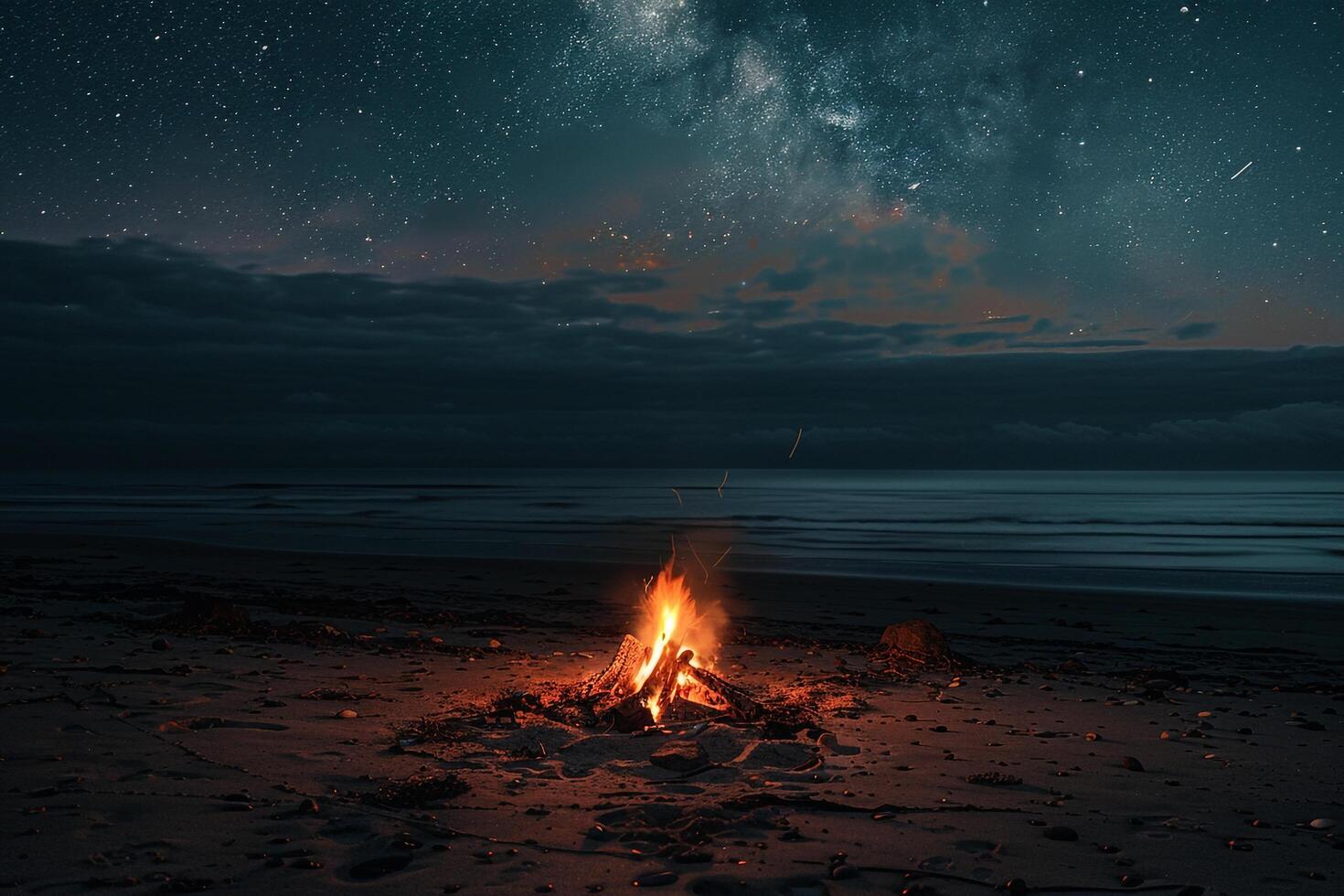 acogedor playa hoguera debajo estrellado cielo con relajante atmósfera antecedentes foto