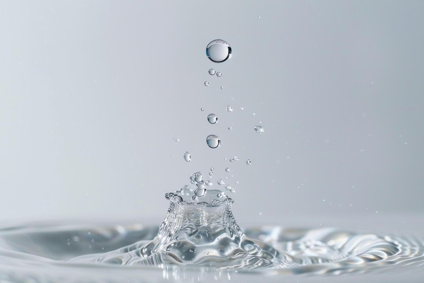 Levitating water droplets creating a mesmerizing visual effect background photo