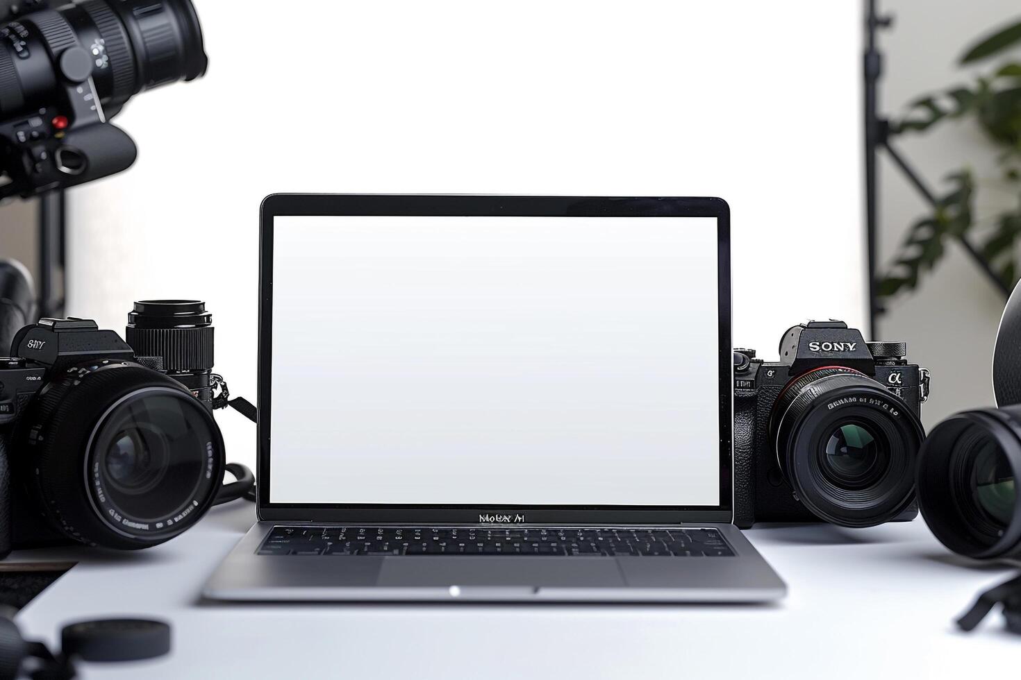 Laptop Mockup Background Surrounded by Camera Gear photo