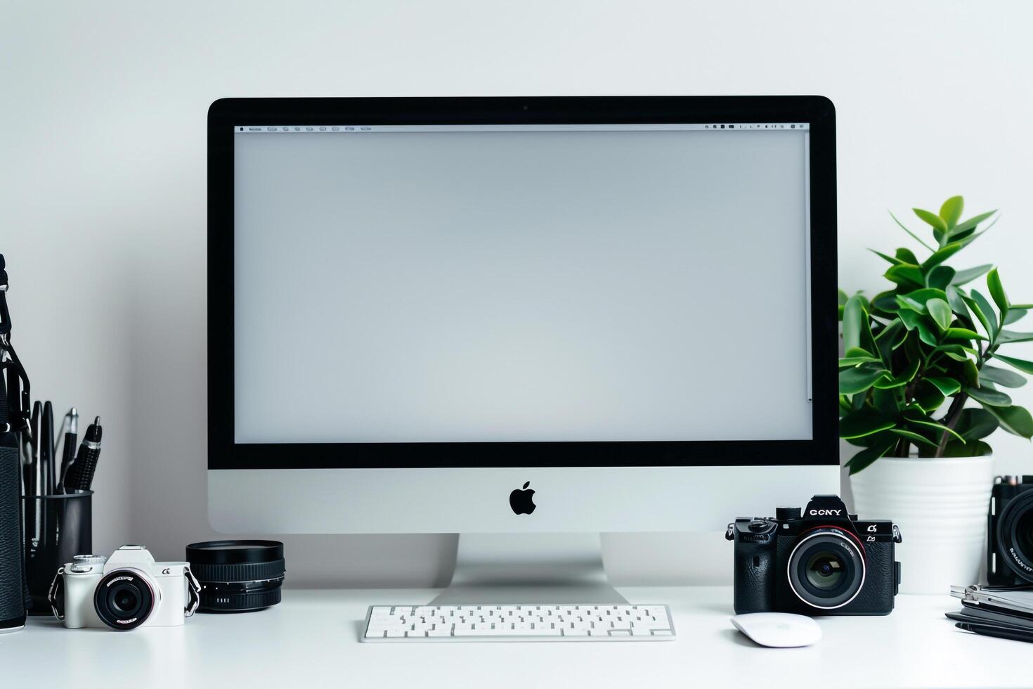 Computer Mockup Background on a white desk with graphy gear and tech gadgets arranged Background photo