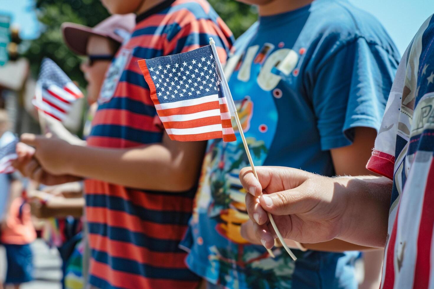 People Hing Small American Flags During Fourth of July Parade photo