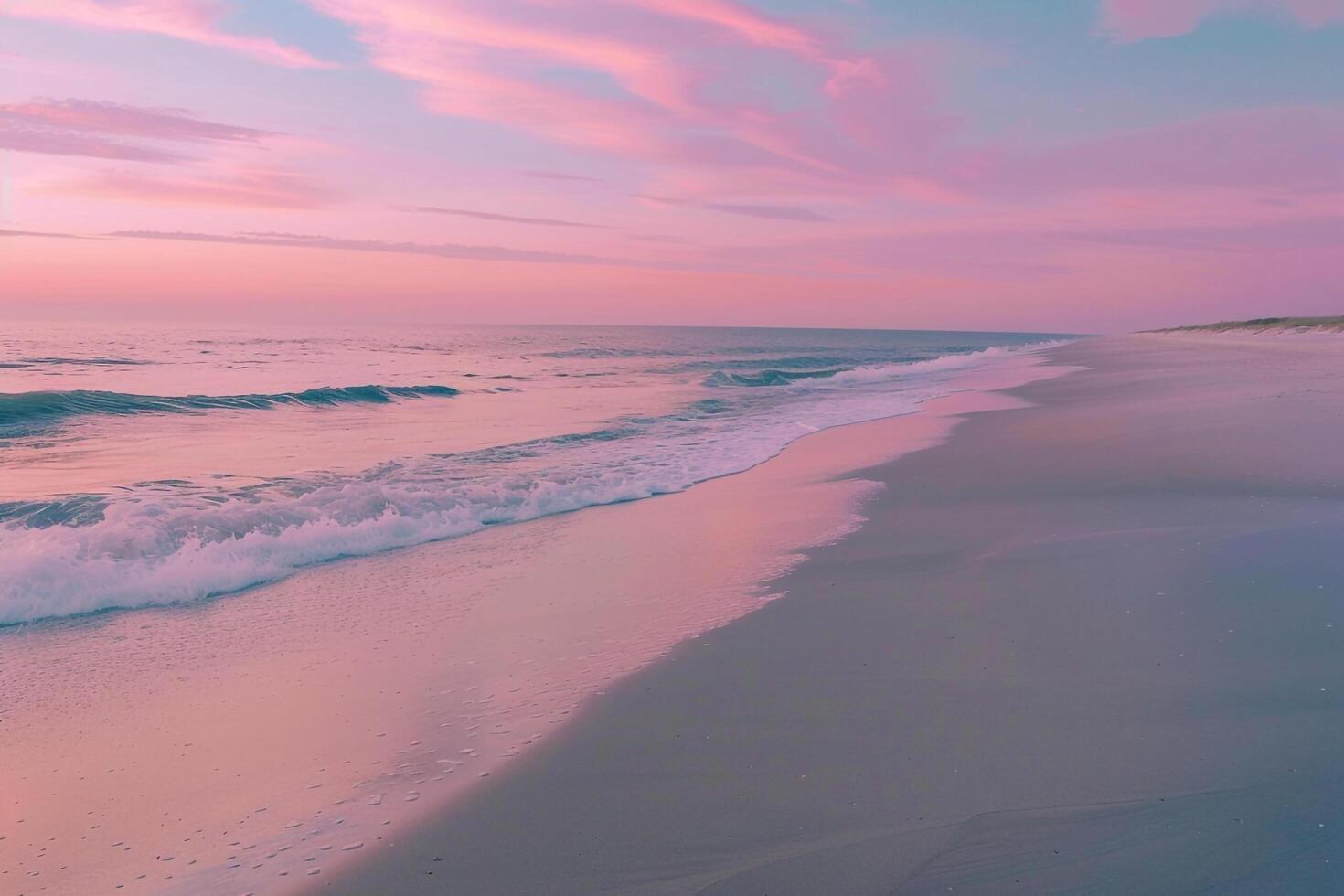 Sandy Beach with Majestic Waves and a Brilliant Sunset Sky Background photo