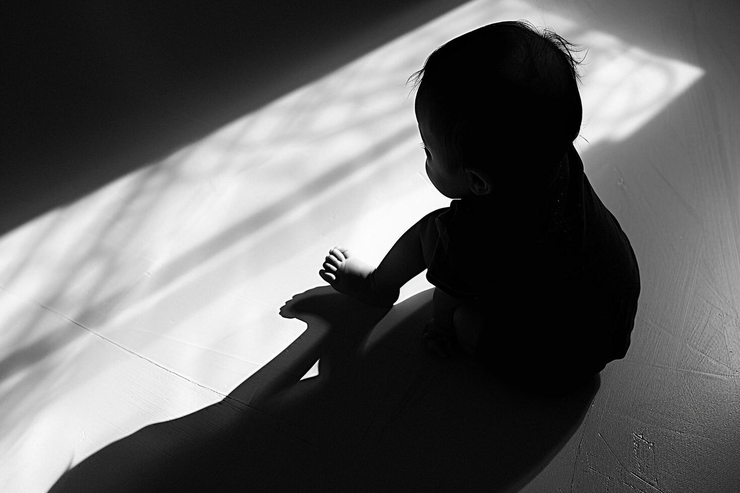 Babys Playful Silhouette in Fun Shadows photo