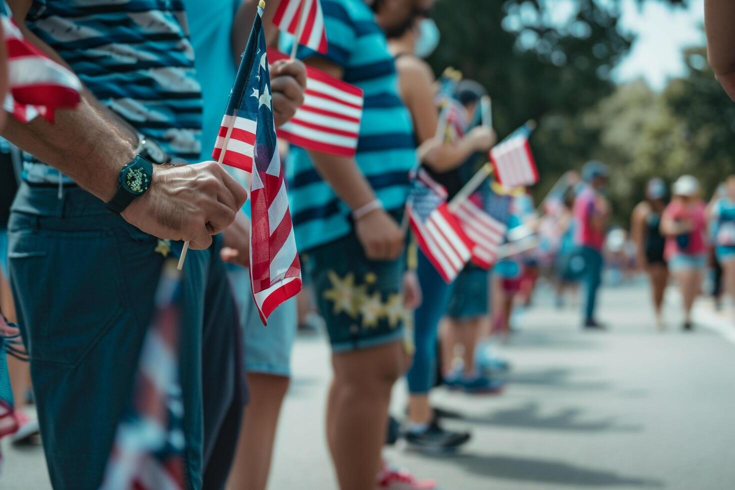People Hing Small American Flags During Fourth of July Parade photo