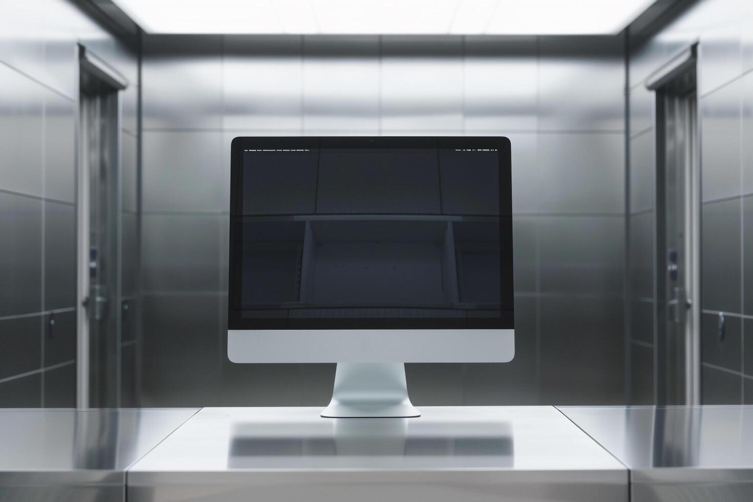 Computer Monitor Mockup on Metallic  Surface for High End Tech Presentation photo