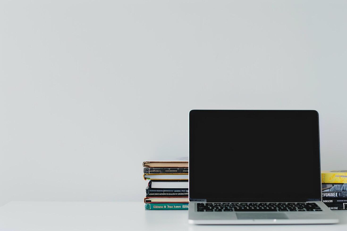 Laptop Mockup with Coding Books on Desk   Professional and  Background photo