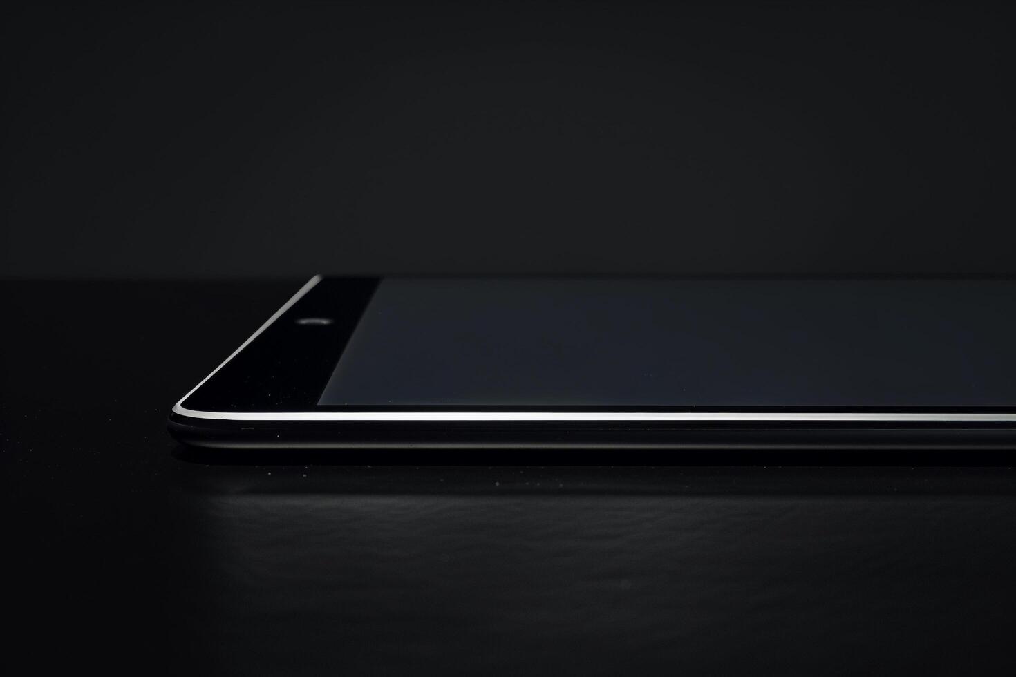 Tablet on Background with  Design photo