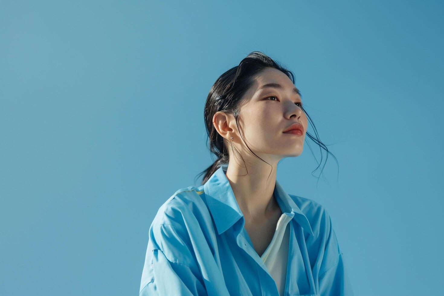 Model engaged in work at desktop station background photo