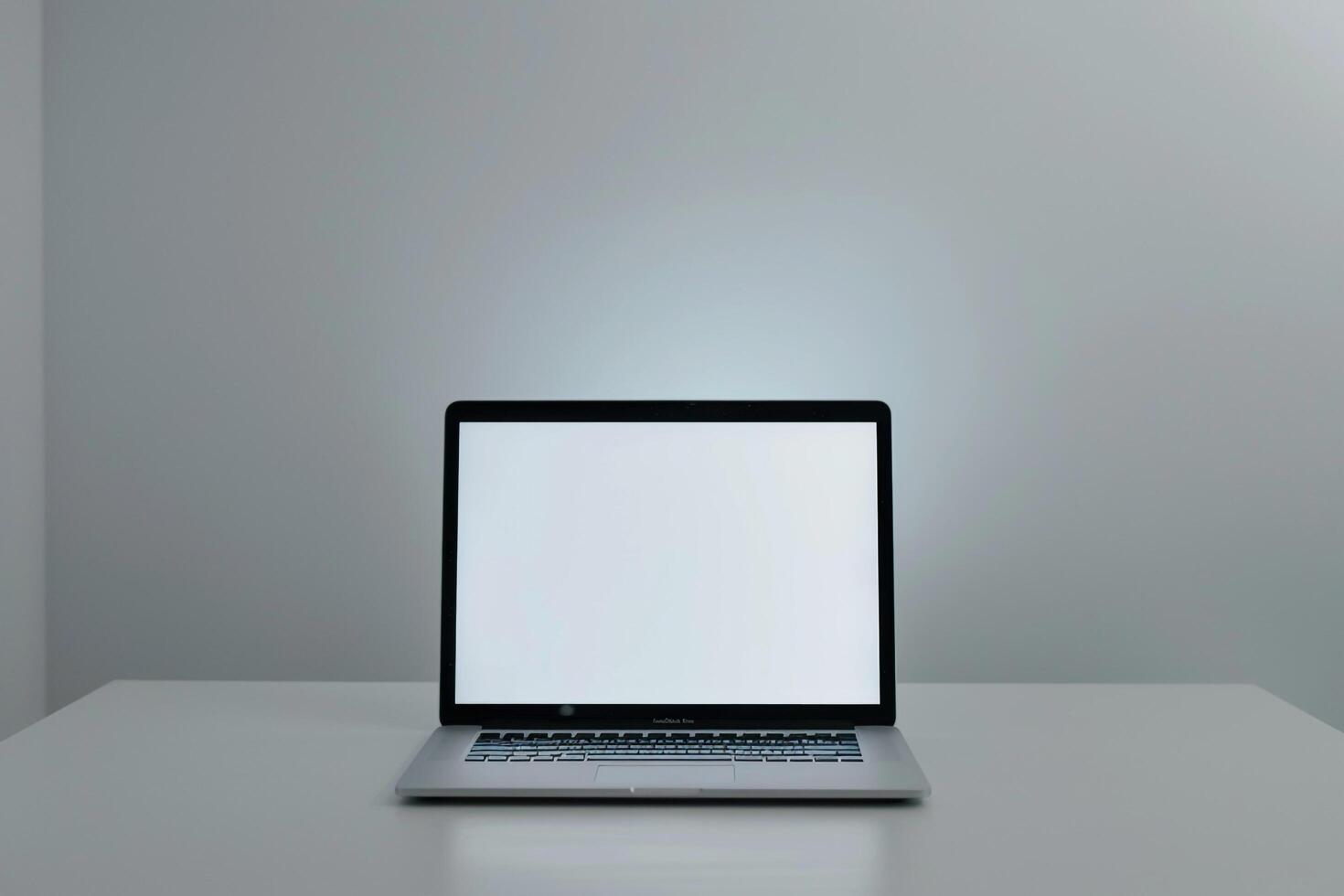 Laptop Mockup Background for productivity with white desk setup photo