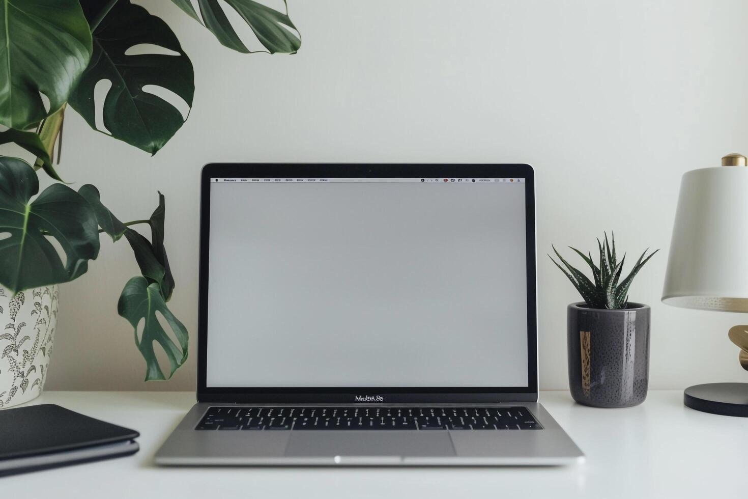 Laptop Mockup Background on white desk for efficient productivity photo