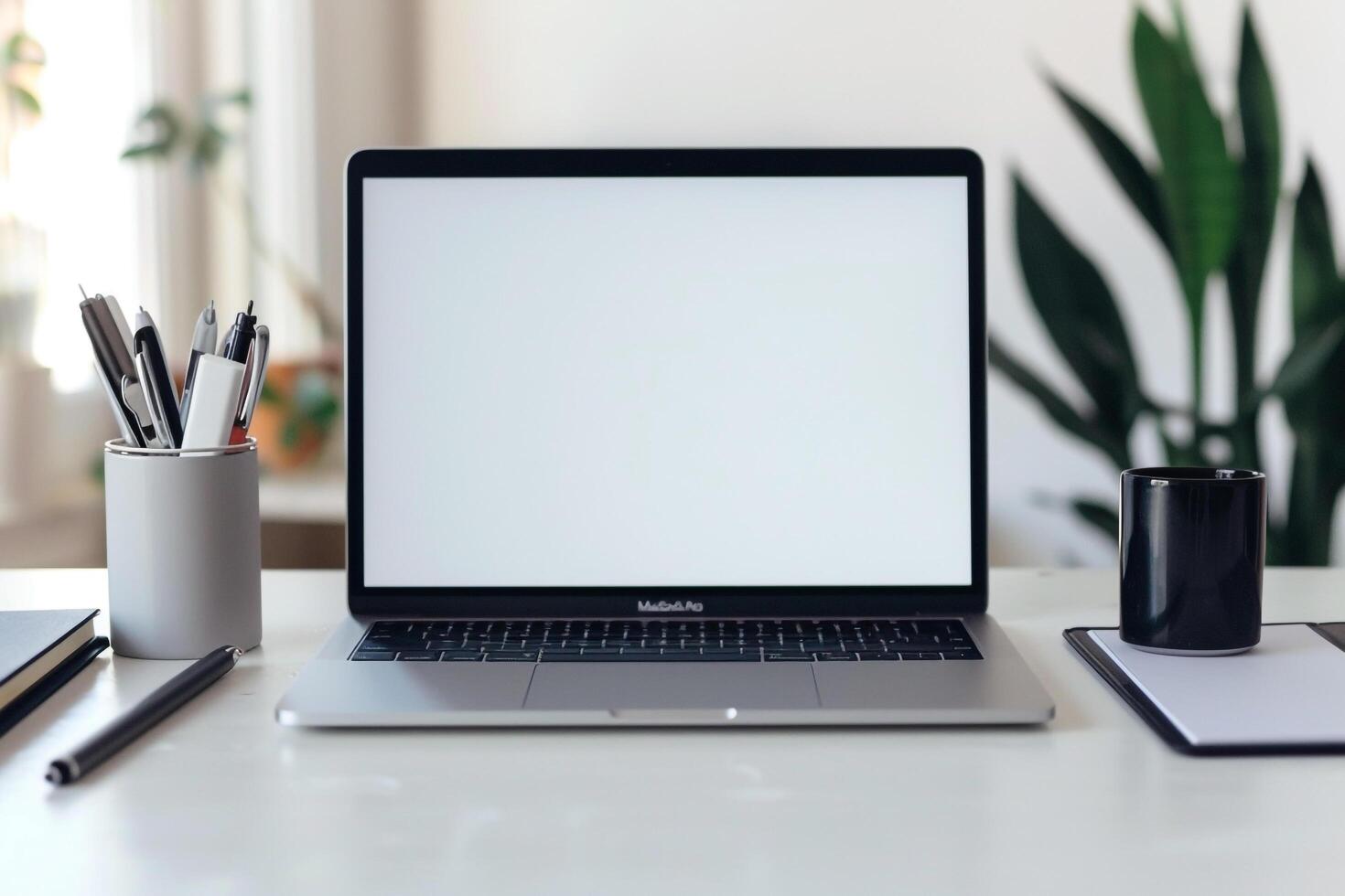 Efficient workspace with Laptop Mockup Background on white desk with office supplies photo