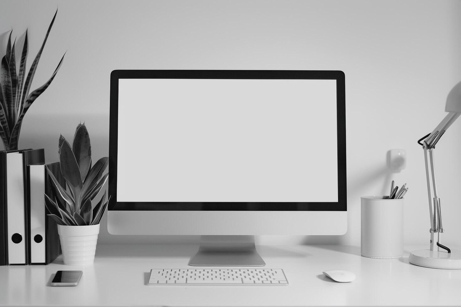 Computer Mockup Background on white desk with research books photo