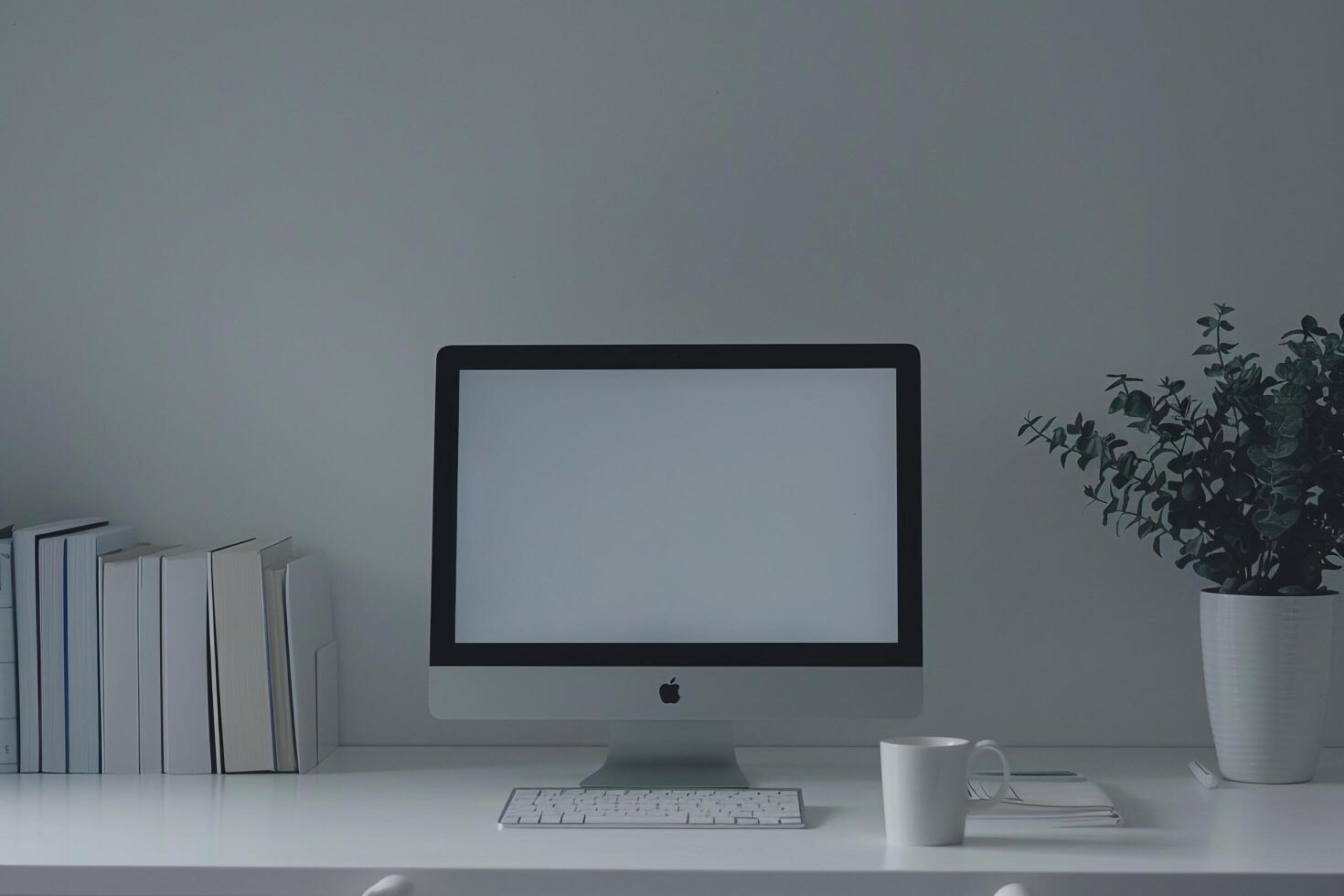 Academic Computer Mockup Background on white desk with research books photo