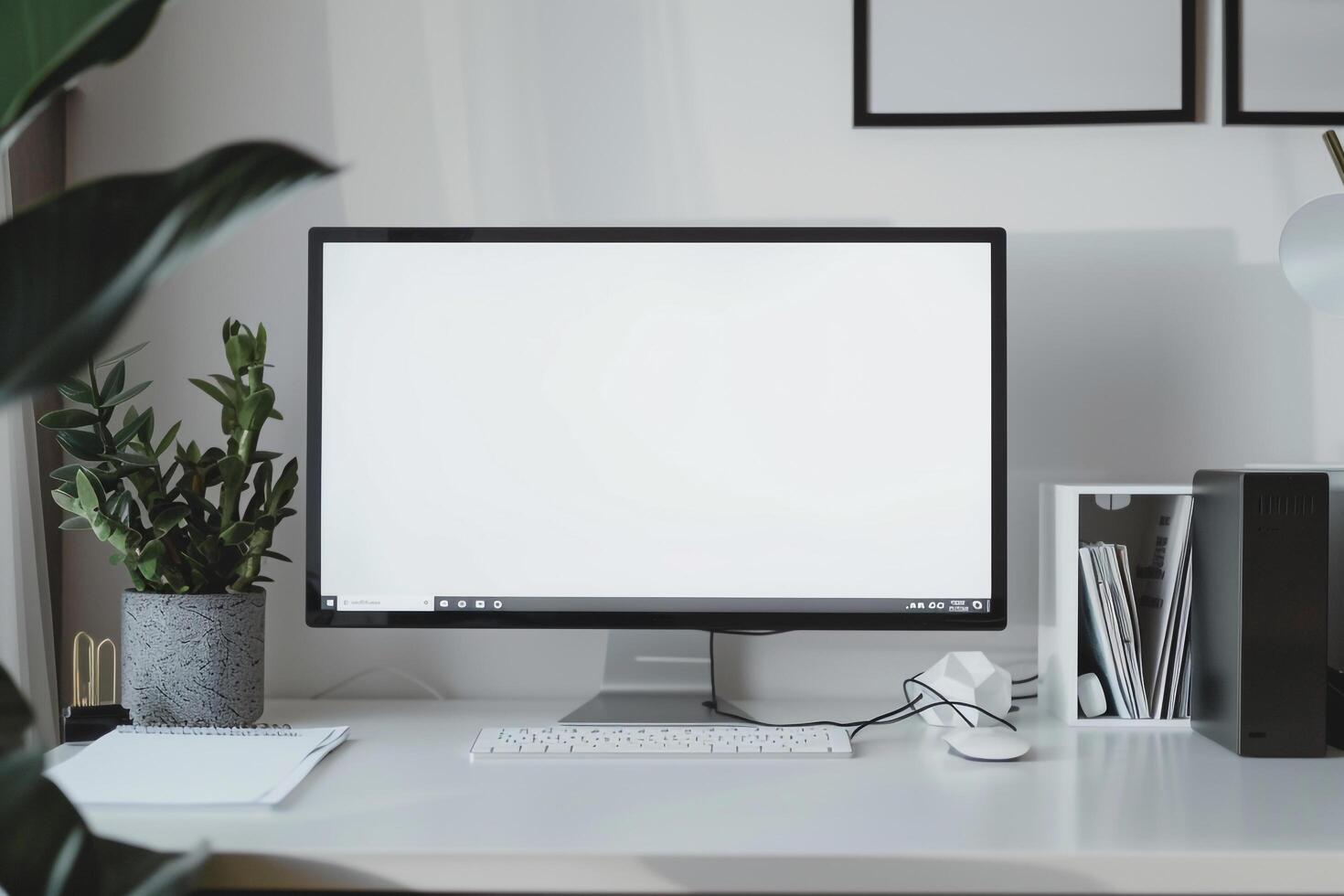 Computer Mockup Background on a White Desk with Papers photo
