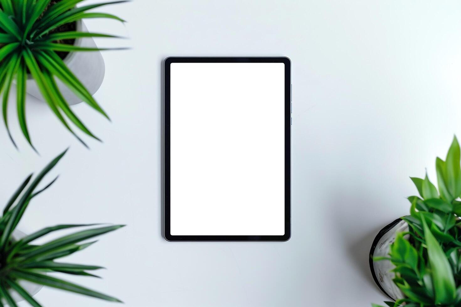 Tablet Displayed on Desktop Setup with Office Accessories photo