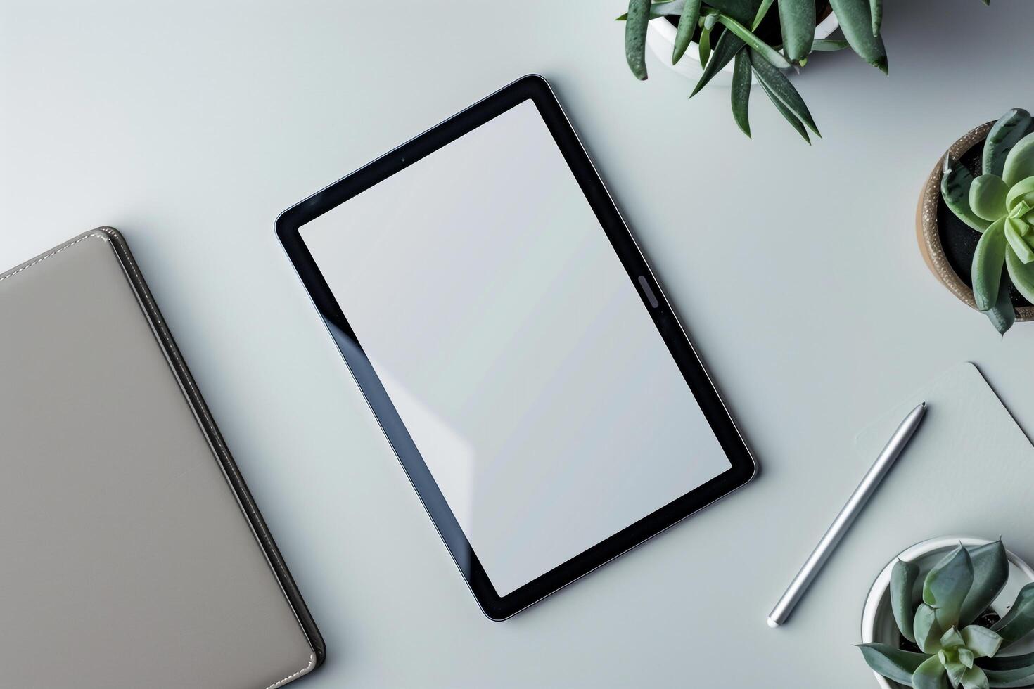 Tablet on Desk with Pen and Notepad and Coffee Mug photo