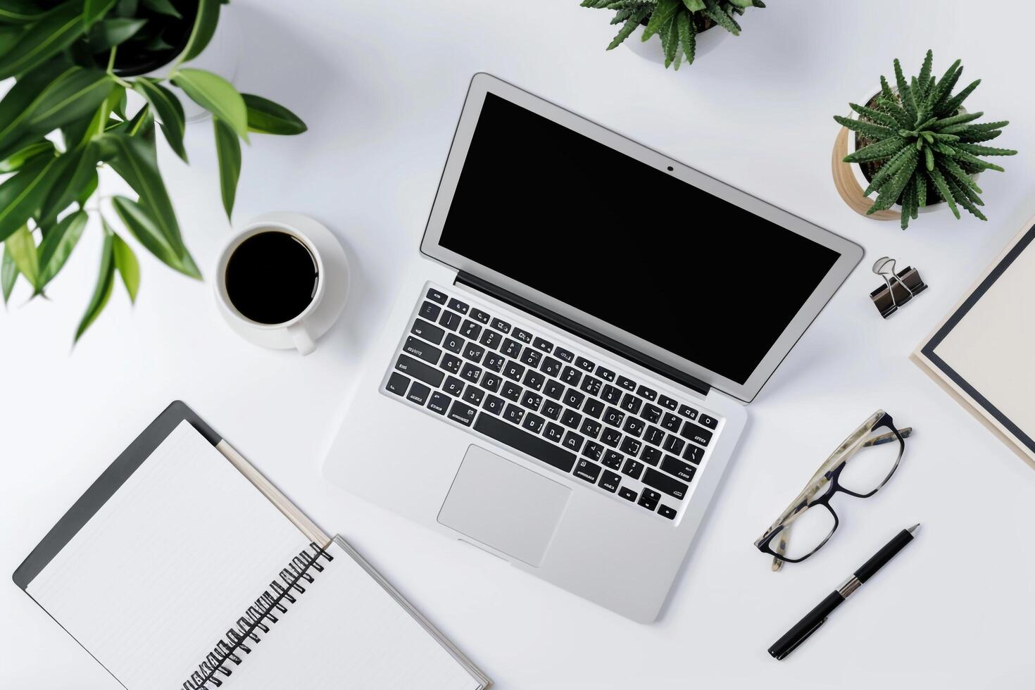 White Desk Background with Laptop Mockup and Open Notebook for   Writing Setup photo