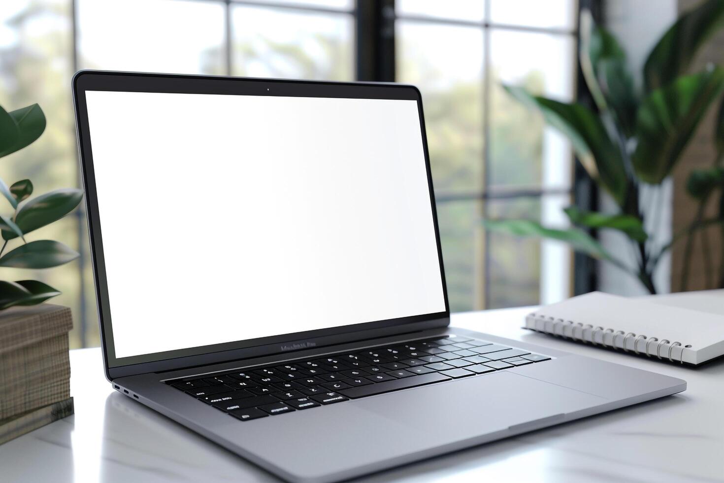 White Desk Background with Laptop Mockup and Open Notebook for   Writing and Work photo