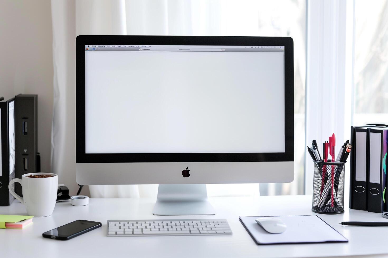 Computer Mockup on White Desk with Notebooks and Pens for Efficient Editing and Writing photo
