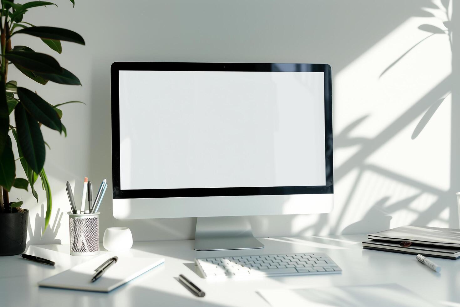 White Desk Computer Mockup with Notebooks and Pens for Effective Writing and Editing photo