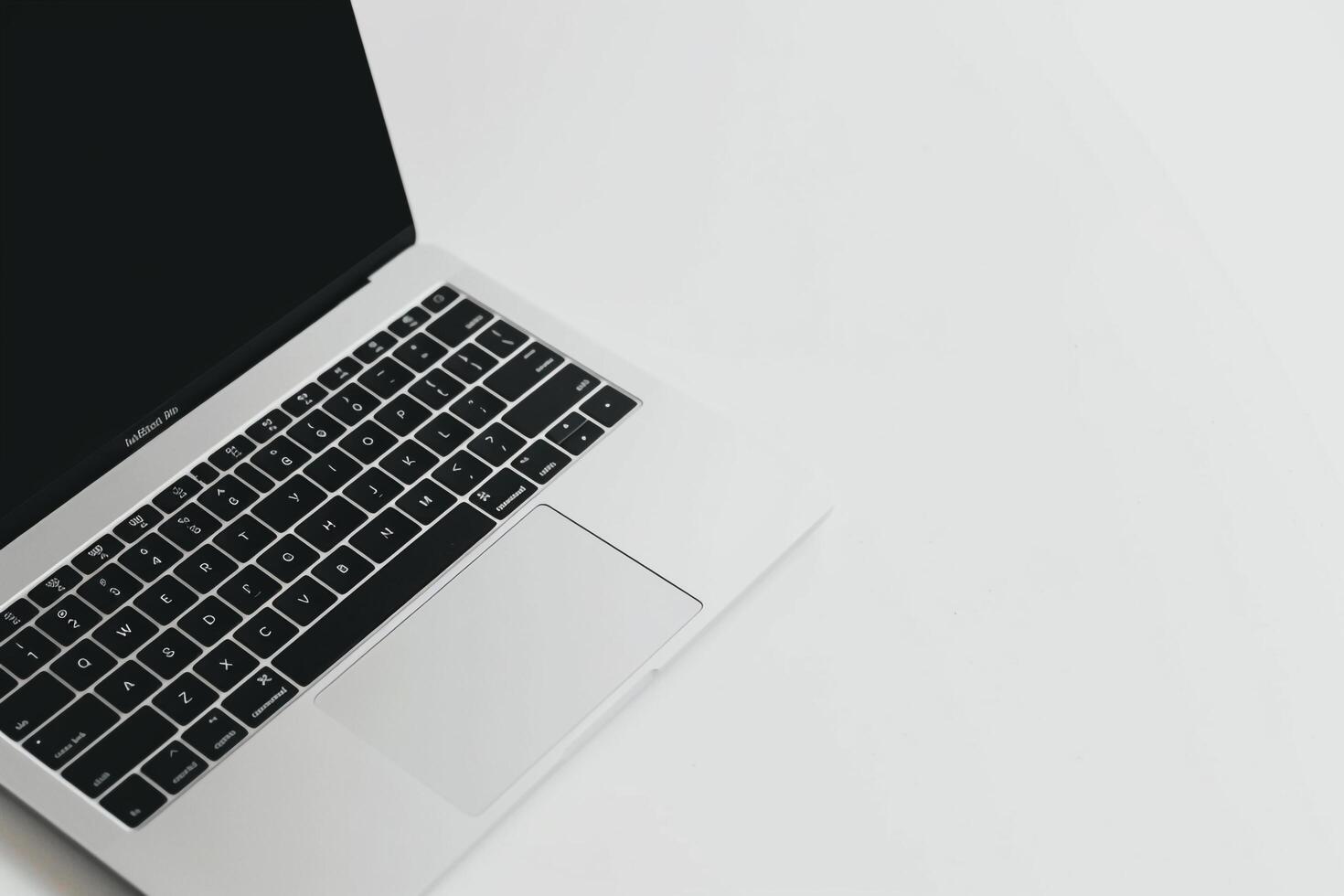 Laptop Mockup Displayed from an Angle with a   Finish photo