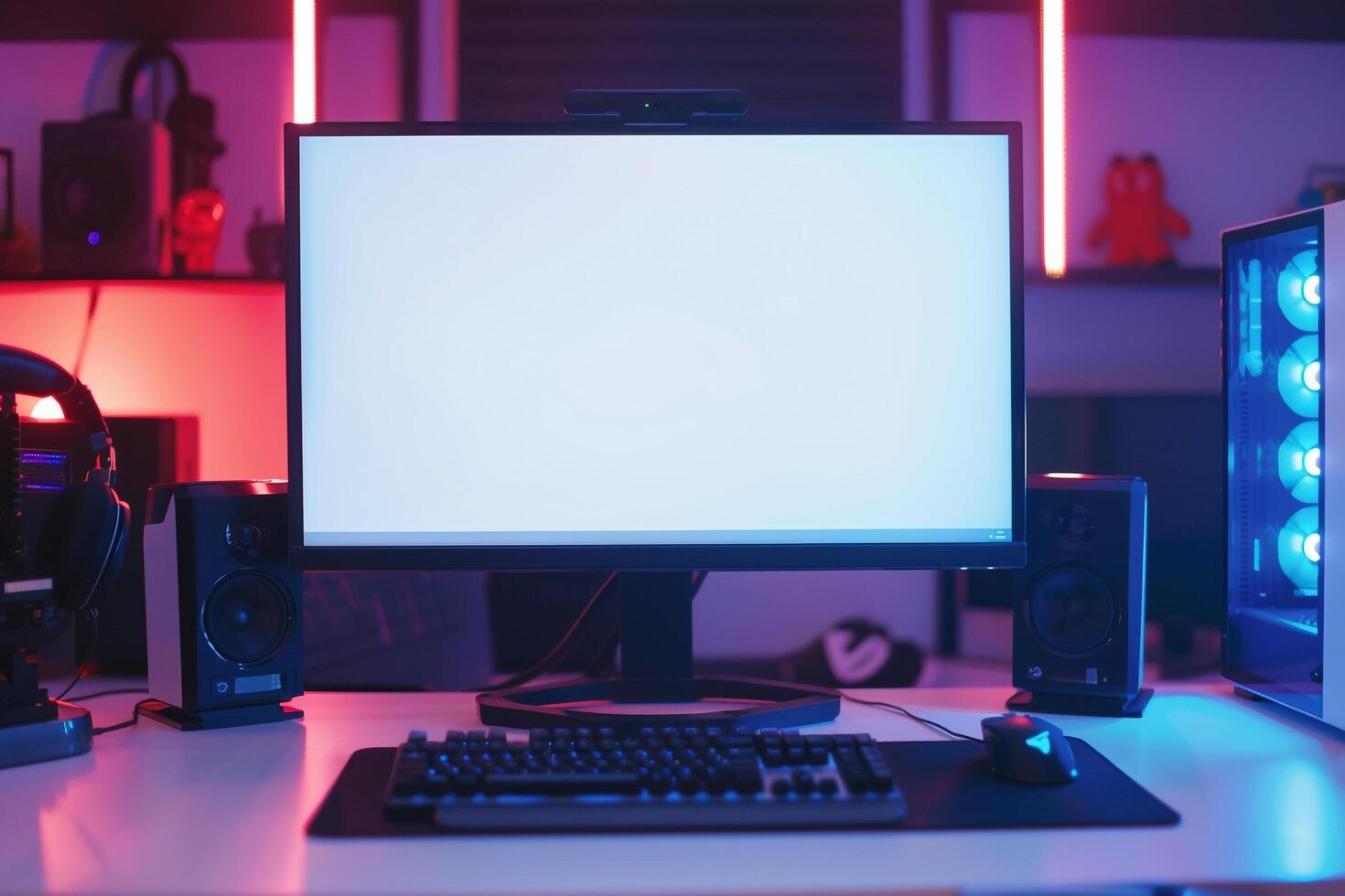 Computer Mockup on a White Desk Surrounded by Gaming Peripherals for a Professional Gaming Setup photo
